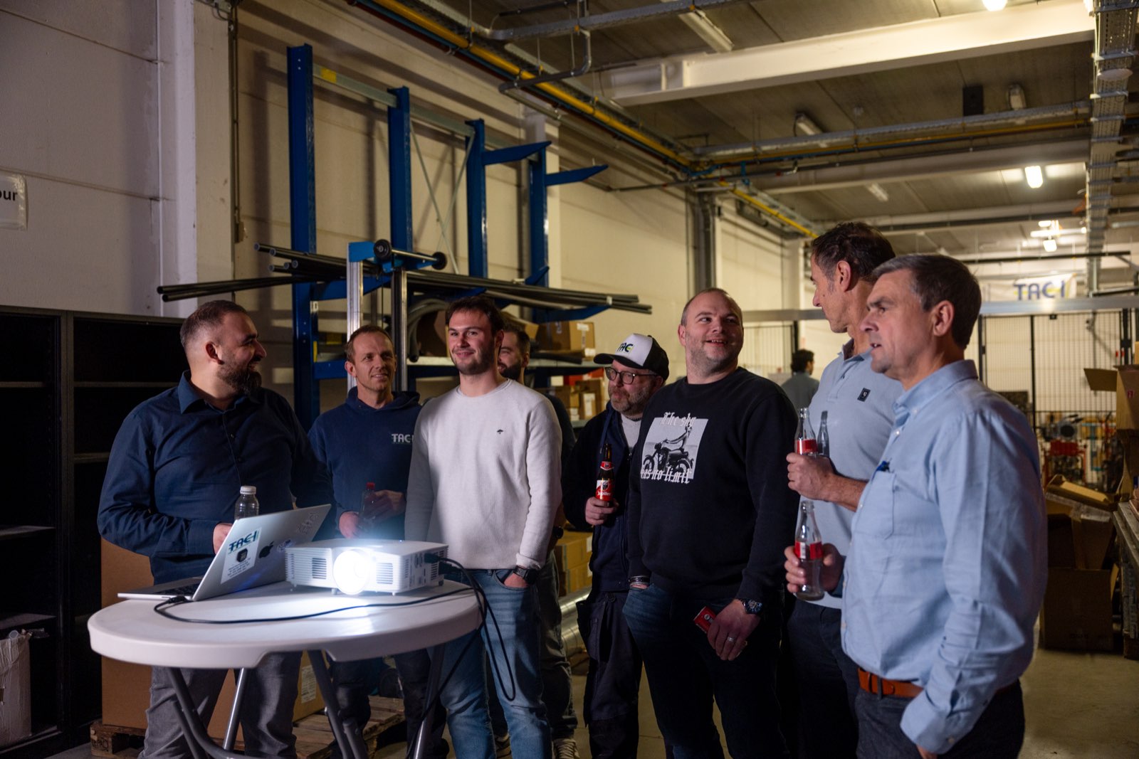 Het team samen tijdens een TACademy-moment